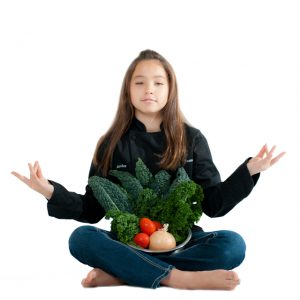 Kid chef Amber kelley with healthy vegetables